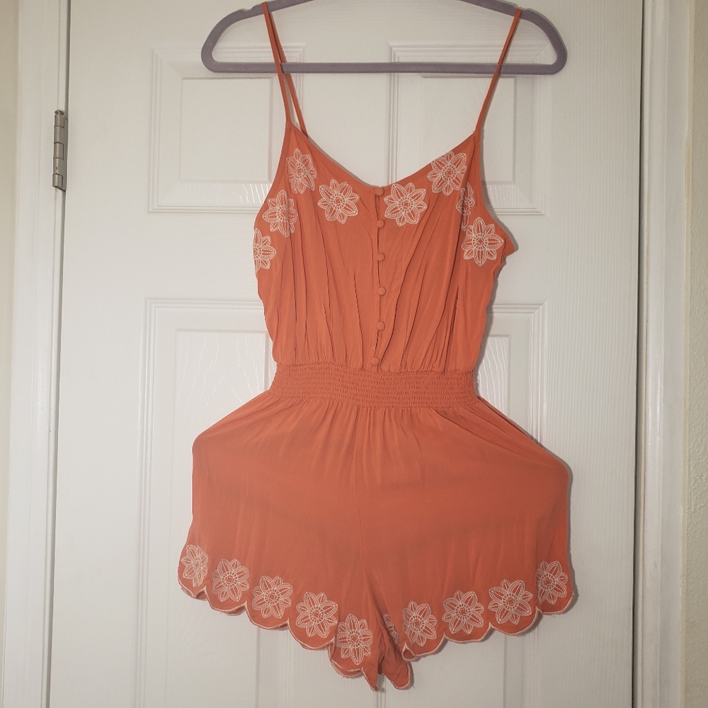 Orange Romper W/White Flowers